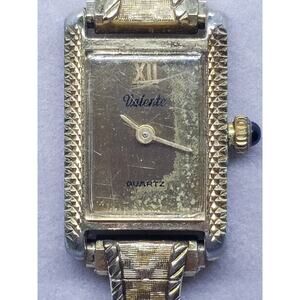 Valente women's watch. Small square gold face. Gold metal band